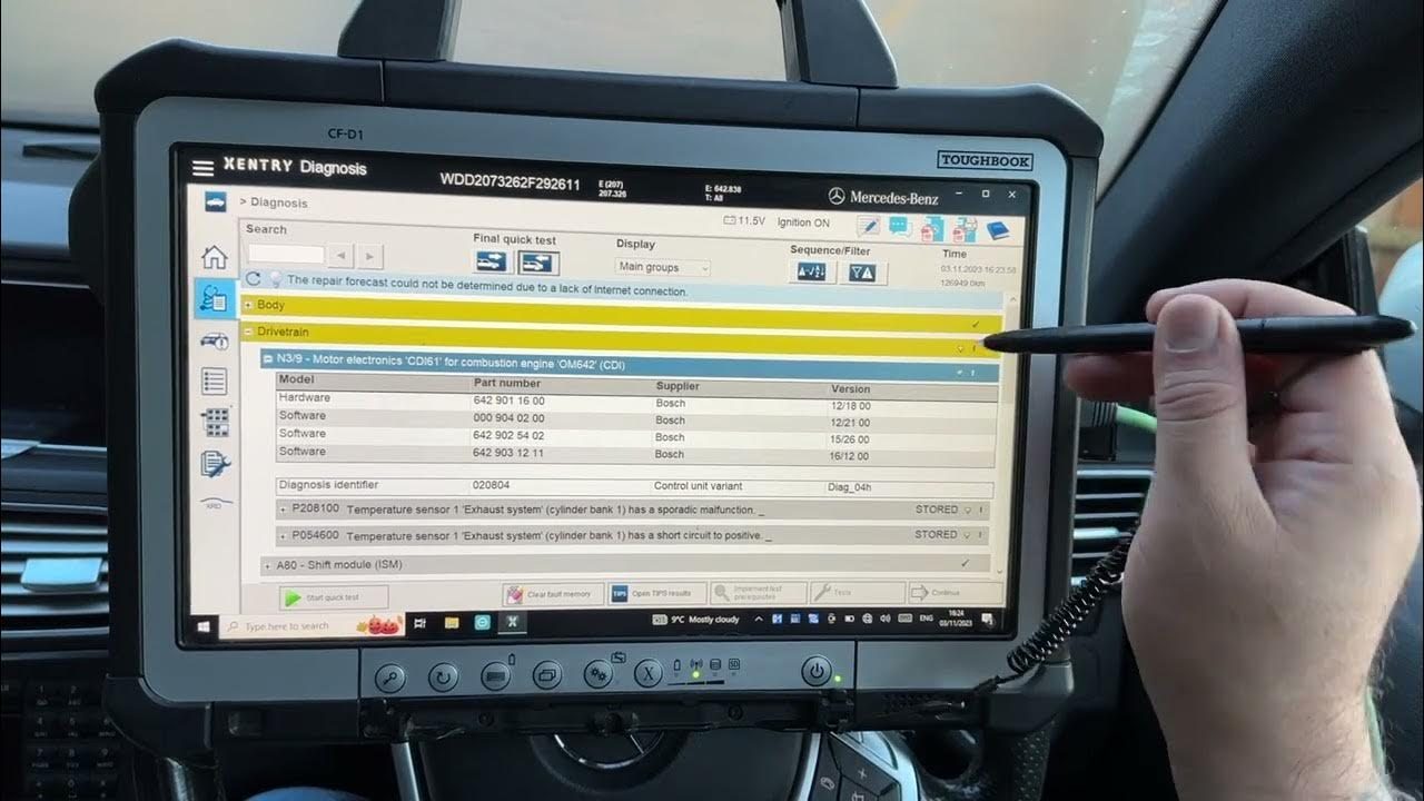 ECU Programming Milton Keynes Mercedes Xentry tablet in a car, interacting with diagnostic software.